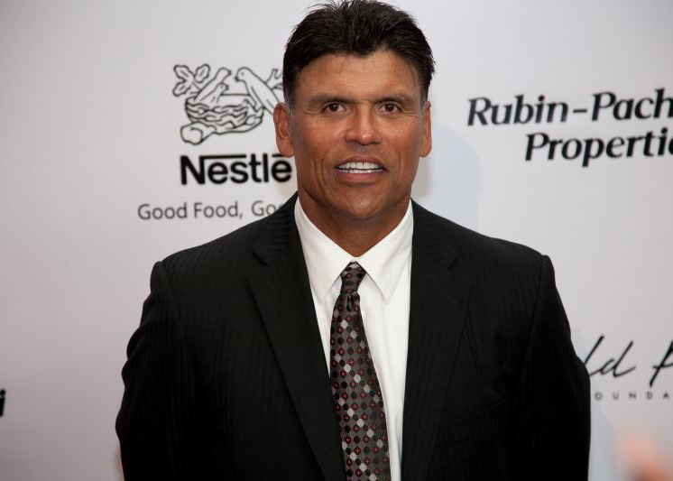 Anthony Munoz with the Pumps